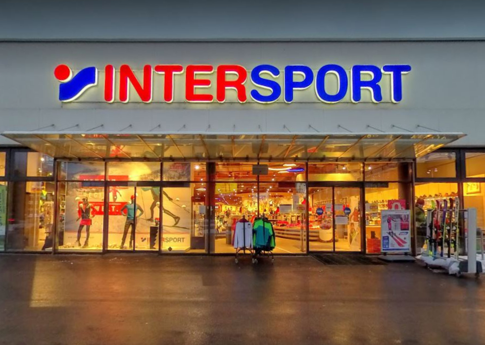 Intersport store exterior; sporting goods retailer with bright signage and window displays.
